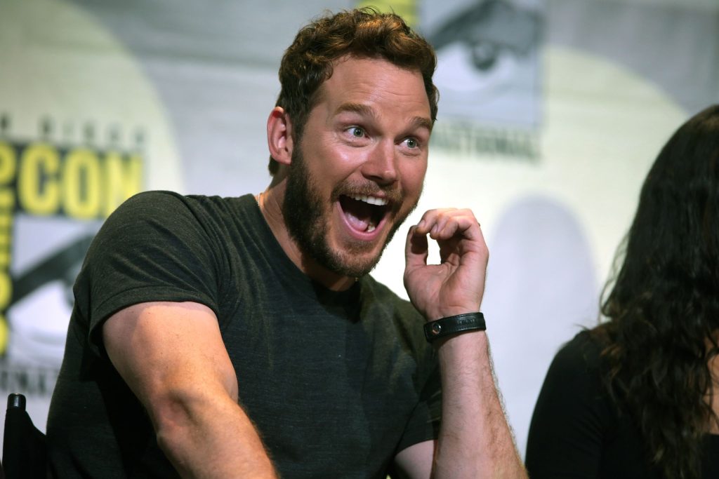 Chris Pratt gesturing and smiling while speaking at the 2016 San Diego Comic Con International, for Guardians of the Galaxy Vol. 2