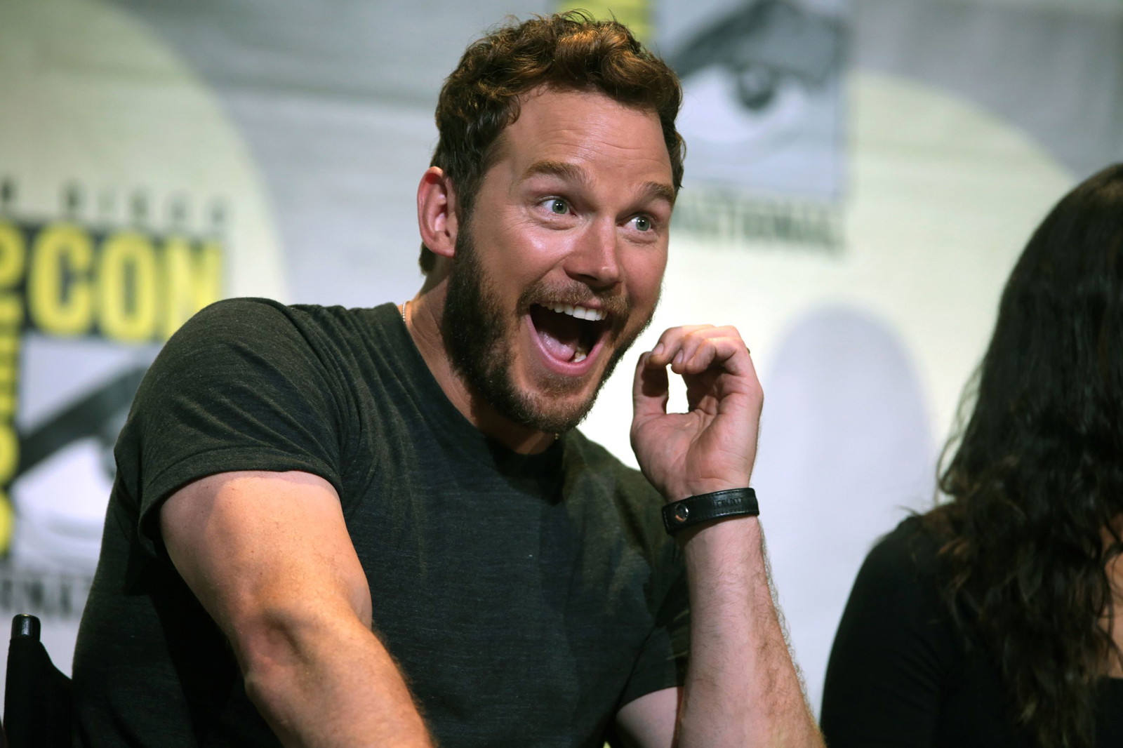 Chris Pratt gesturing and smiling while speaking at the 2016 San Diego Comic Con International, for Guardians of the Galaxy Vol. 2
