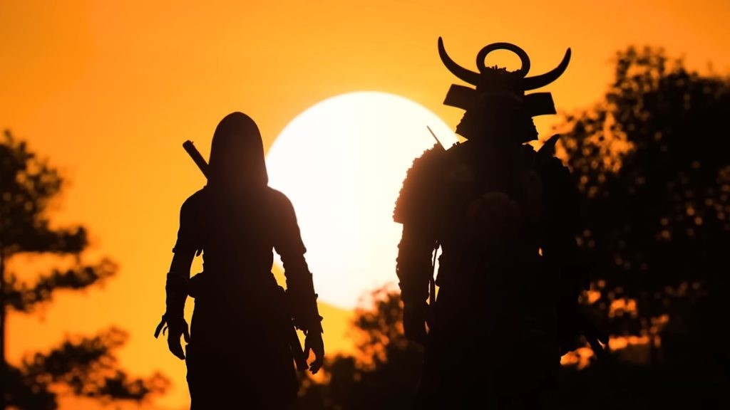 A silhouette of Naoe and Yasuke, the twoprotagonists of Assassin's Creed Shadows.