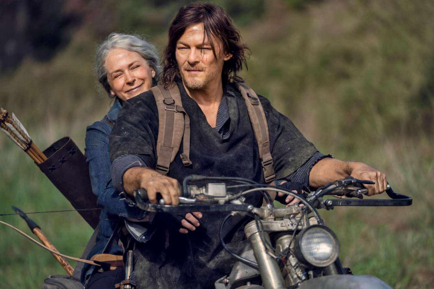 Norman Reedus riding a motorbike in a still from The Walking Dead