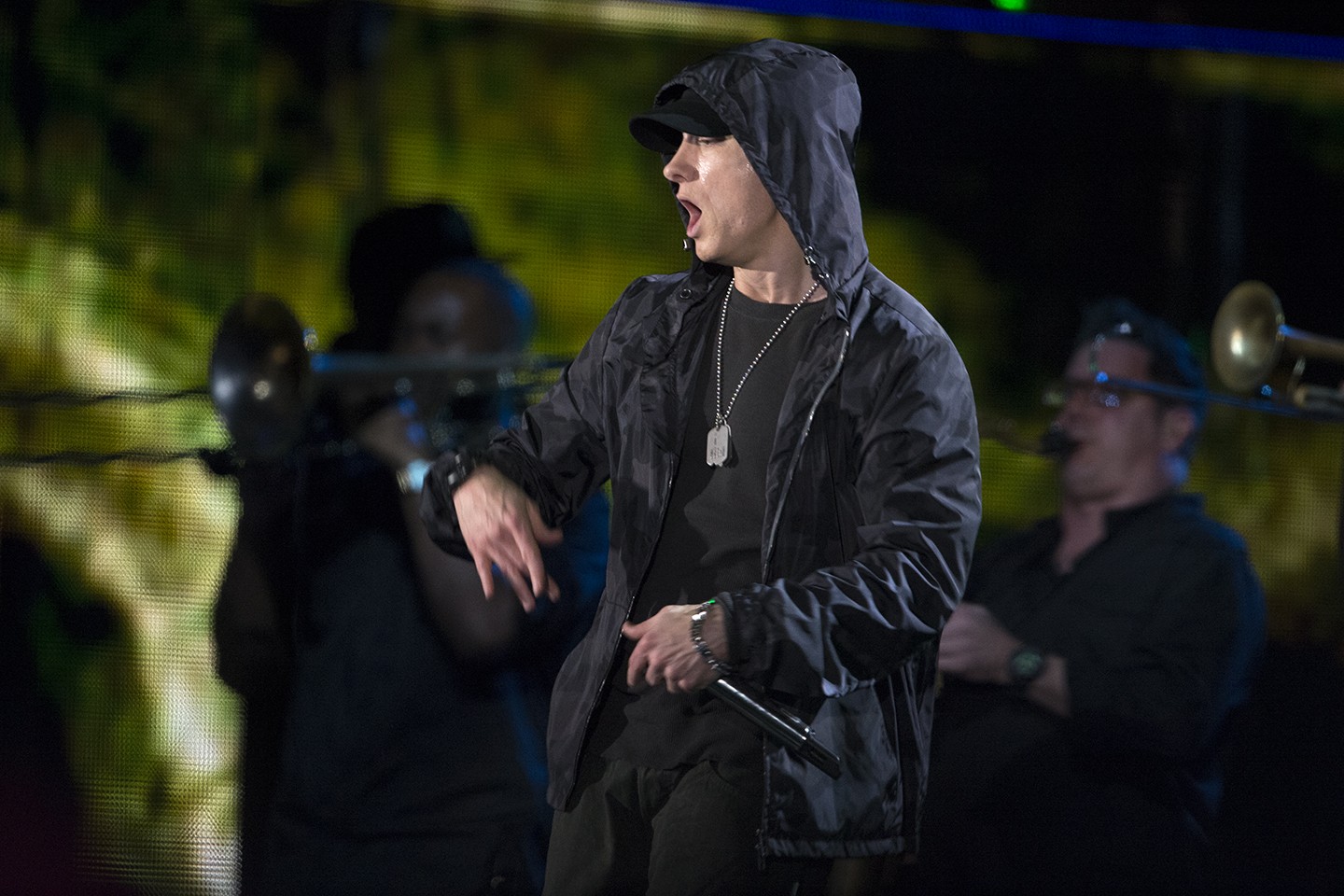 Eminem rapping with a live band during The Concert for Valor in Washington, DC