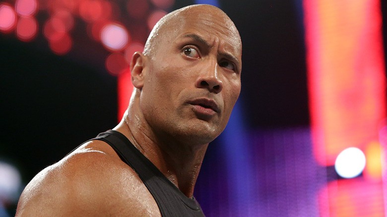 Dwayne Johnson as The Rock in the WWE ring
