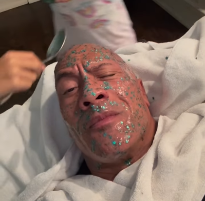 Dwayne Johnson gets glittered by his daughters on Father's Day
