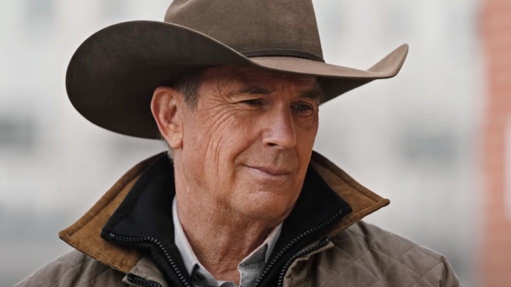 Kevin Costner smiling as John Dutton in a still from Yellowstone