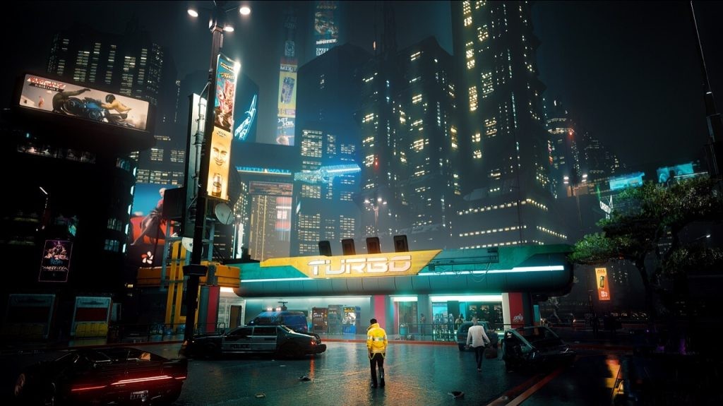 Cyberpunk 2077 in-game screenshot featuring a zoomed out shot of Night City, complete with tall buildings and a vibrantly lit setting.