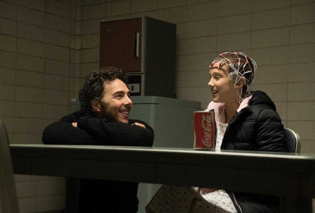 Shawn Levy with Millie Bobby Brown on the sets of Stranger Things [Credit: Curtis Baker/Netflix Inc.]