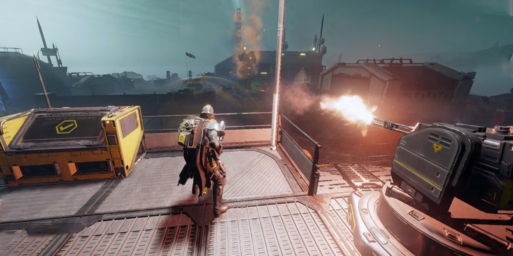 The image shows a players firing a turret in Helldivers 2