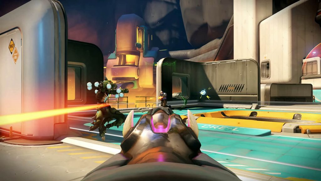 An Overwatch 2 gameplay screenshot showing Ashe targeting Soldier 76 during an ongoing match.