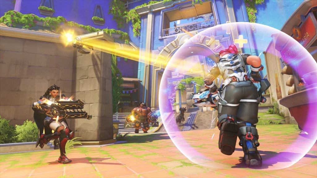 Zarya from Overwatch 2 being healed and shielded during a game. 