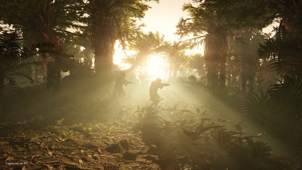 the image shows players walking through a forest in Helldivers 2 