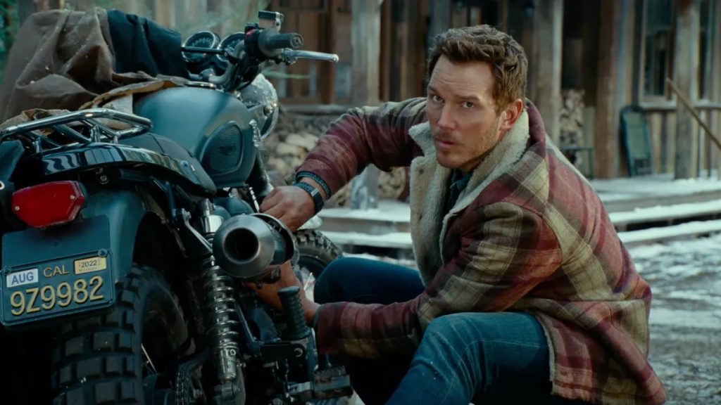 Chris Pratt fixing his bike in Jurassic World: Dominion