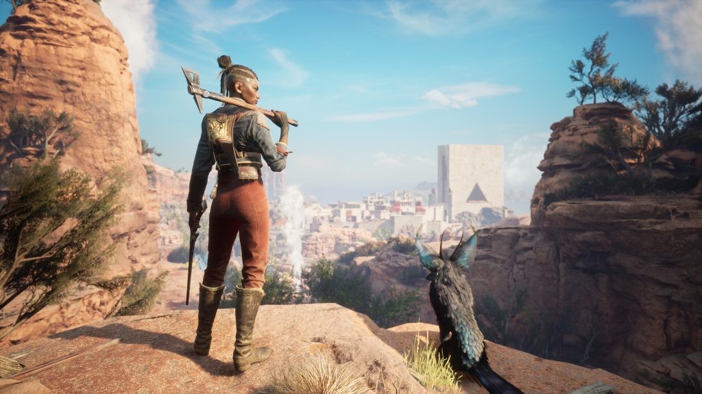 Nor and Enki standing atop a cliff overlooking a city in Flintlock: The Siege of Dawn.