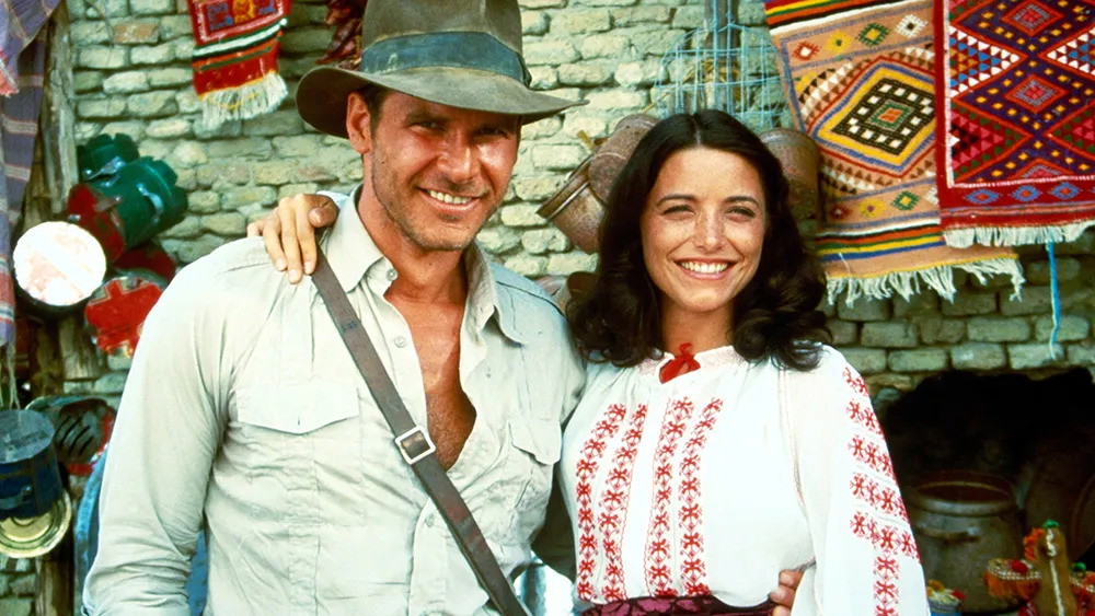 Harrison Ford and Karen Allen on the sets of Raiders of the Lost Ark (1981) [Credit: Paramount Pictures]