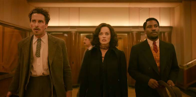 Christian Bale, John David Washington, and Margot Robbie in David O Russell’s movie 