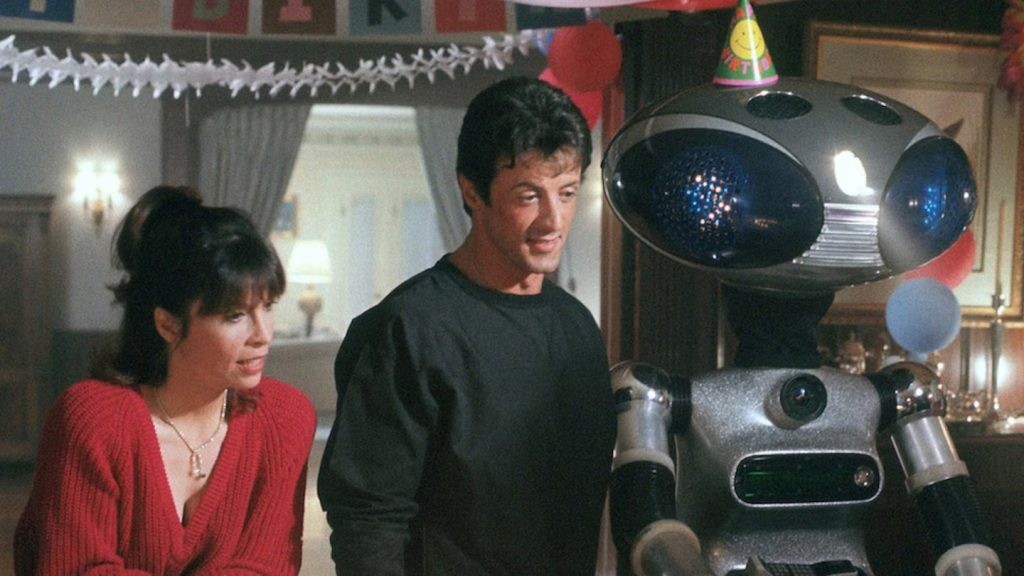 Stallone gifting Paulie the robot on his birthday. | Credit: United Artists.