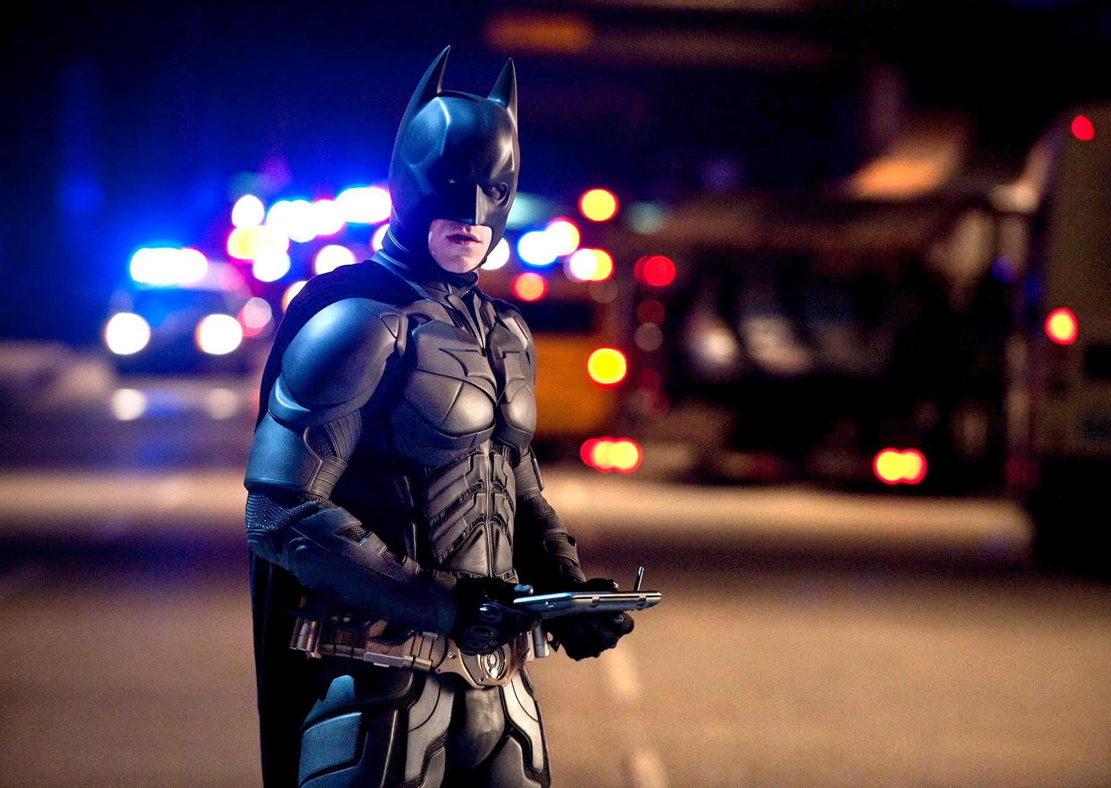 Batman gets pursued by cops after he makes his unexpected return in The Dark Knight Rises | Warner Bros