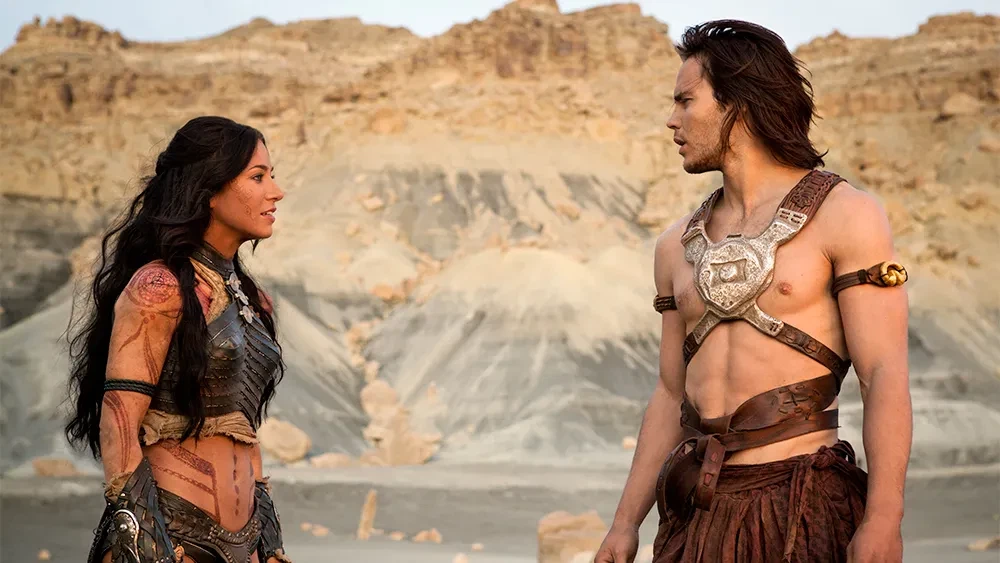 Taylor Kitsch and Lynn Collins in a still from John Carter | Walt Disney Pictures