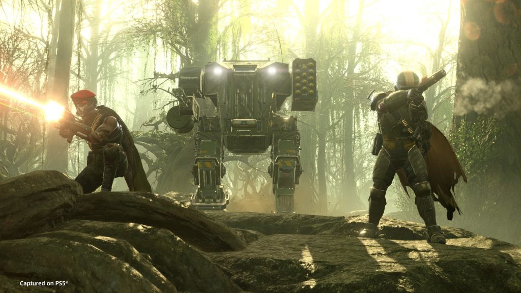 Helldivers 2 characters in a forest biome with guns.