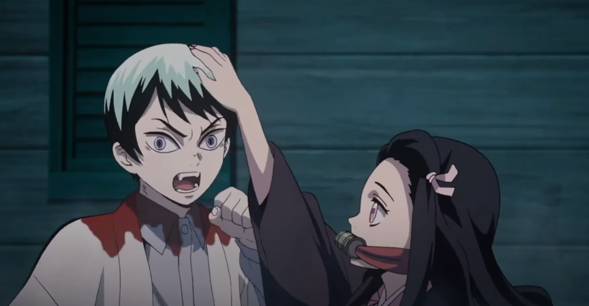 Yushiro getting pat by Nezuko