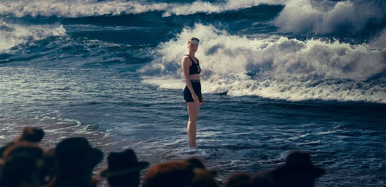 Daisy Ridley in a still from Young Woman and the Sea | Disney