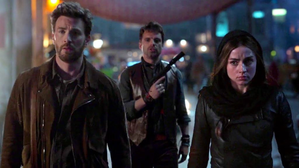 Chris Evans, Sebastian Stan, and Ana de Armas in a still from Ghosted | Apple TV+