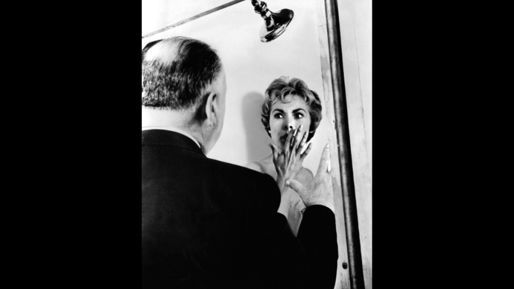 Alfred Hitchcock directing Janet Leigh in the famous scene in Psycho