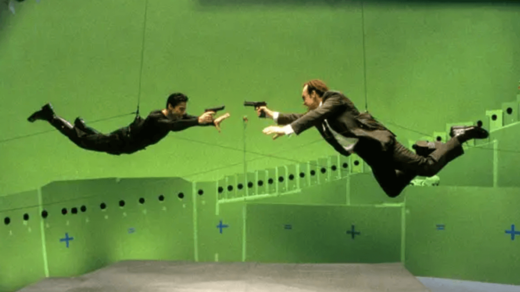 Keanu Reeves and Hugo Weaving filming a stunt in The Matrix