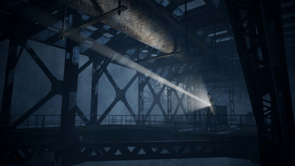 Alan Wake Remastered screenshot showing the protagonist at night shining his flashlight