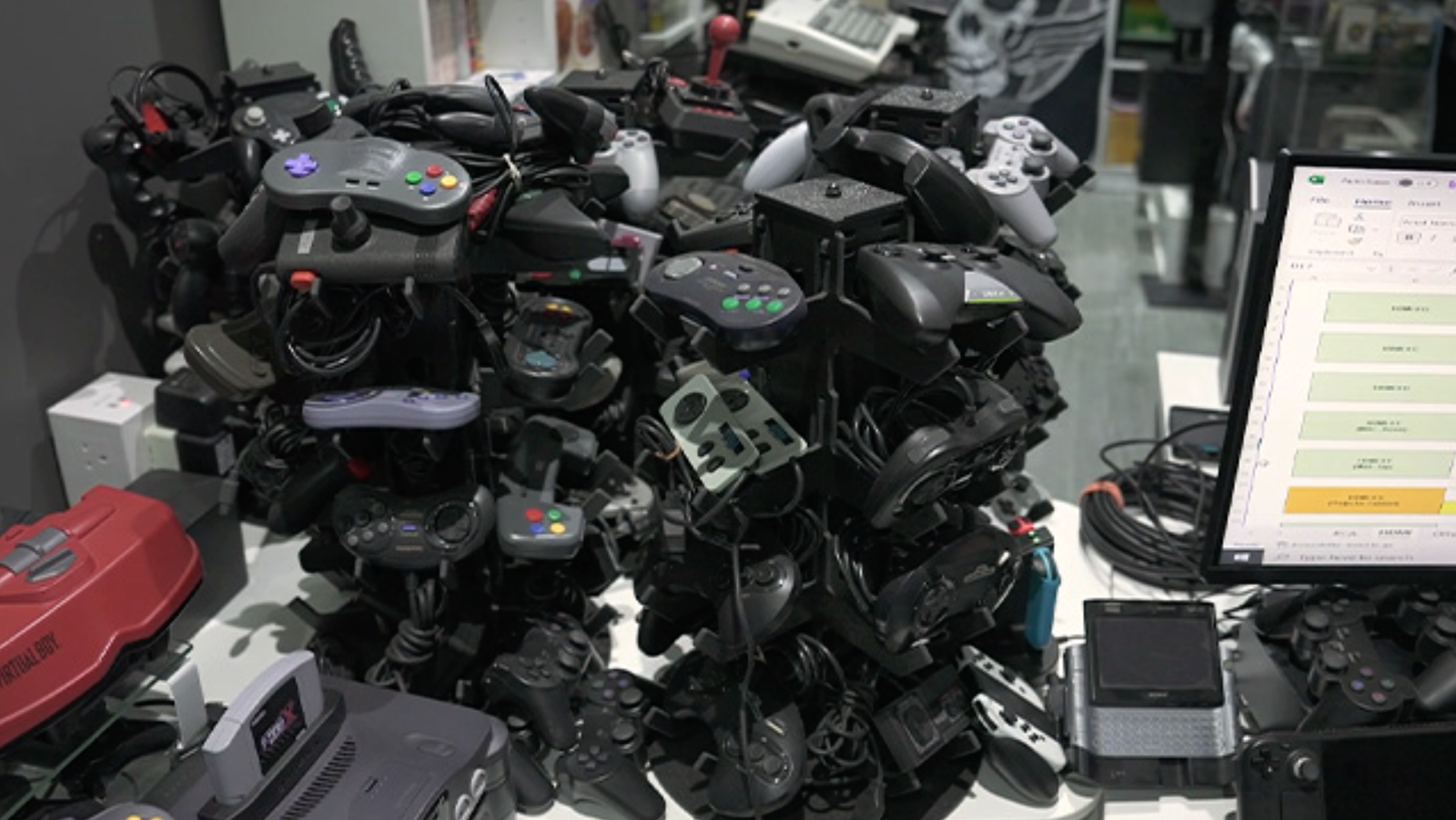 Have You Ever Wondered What 444 Game Consoles Hooked Up To A Single TV Looks Like? If So, Then You Are In Luck