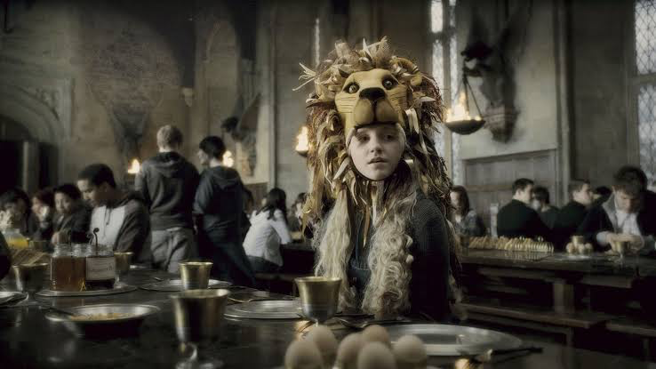 Luna Lovegood in her handmade Lion Headdress | image: Warner Bros. 