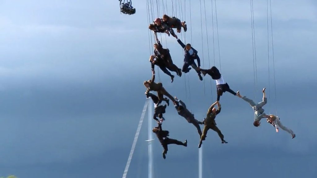 The Red Bull skydiving team hangs on wires