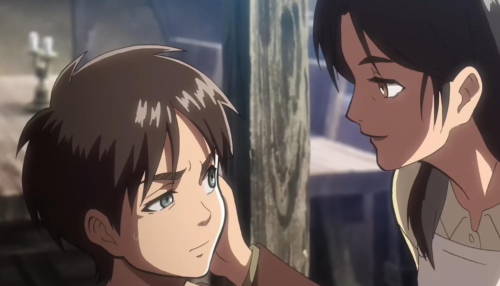 The picture shows an angry Eren with his mother in front of him 