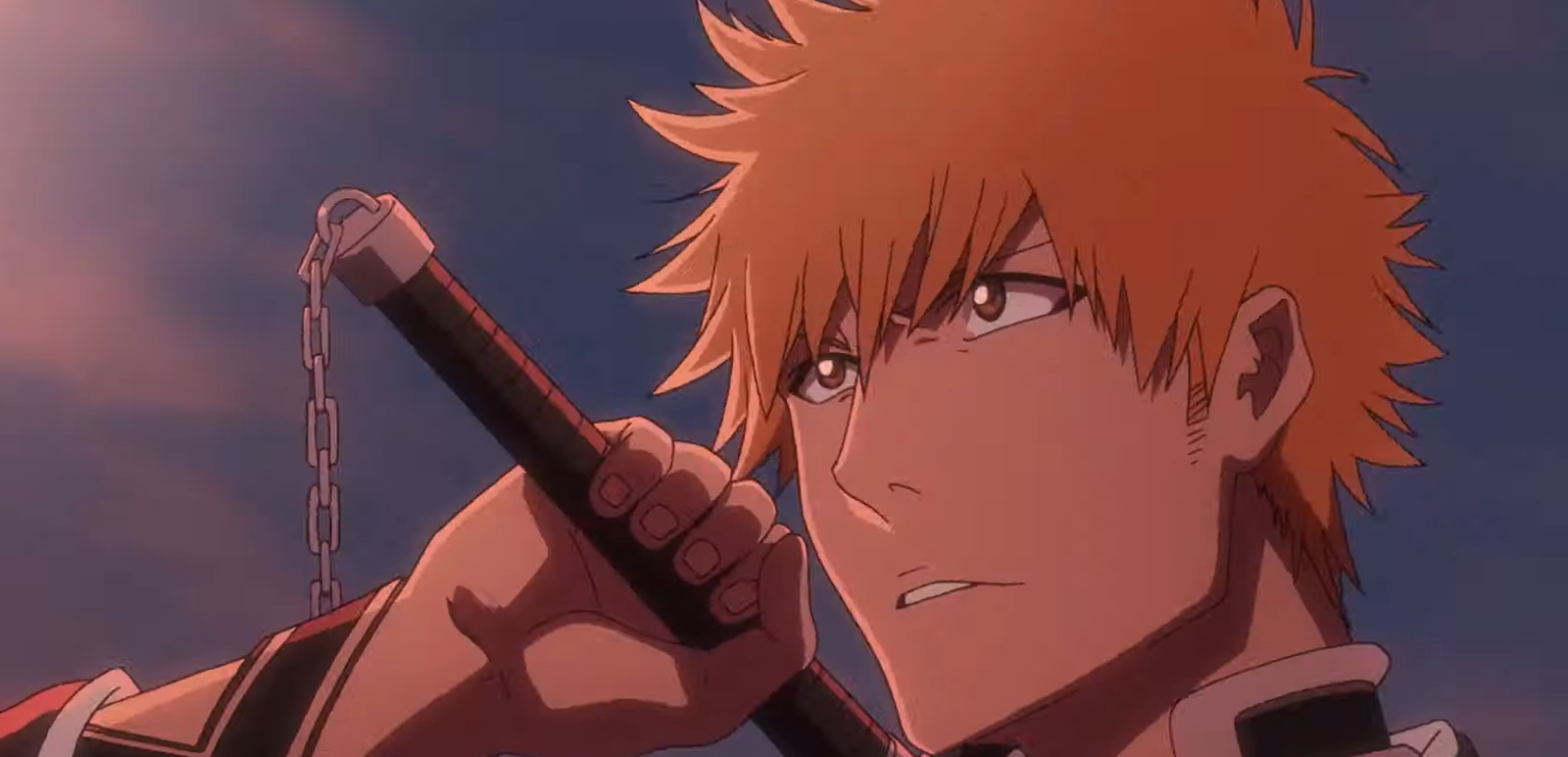 Ichigo is looking upwards with his hand on his sword in Bleach Thousand year blood war