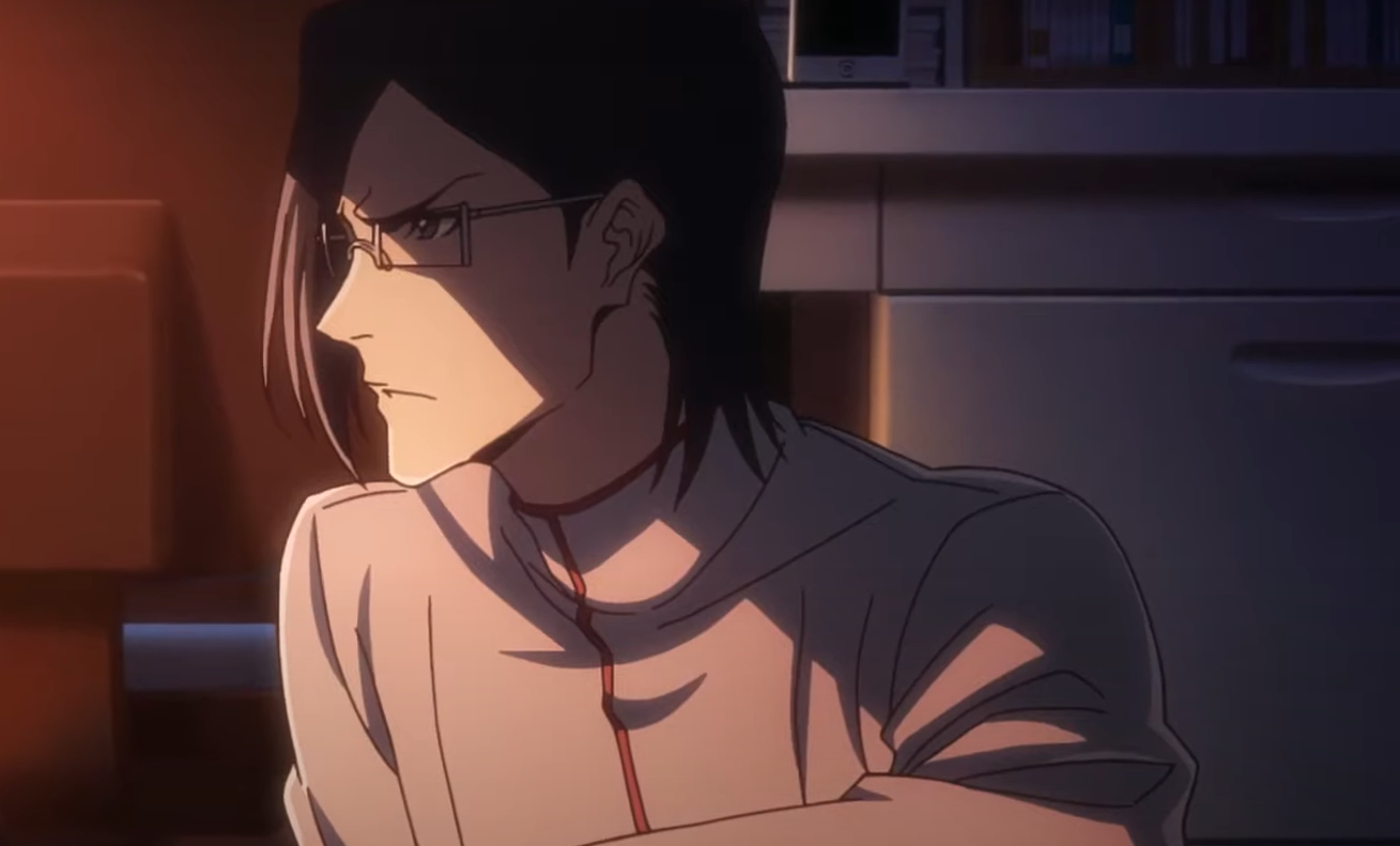 Half of Uryu Ishida's face is glowing as light falls on him in Bleach