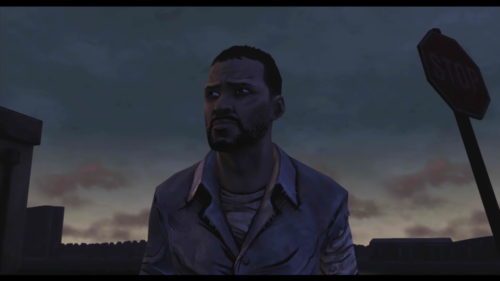 Lee Everret from Telltale's The Walking Dead Season 1 surveying a street filled with Shamblers.