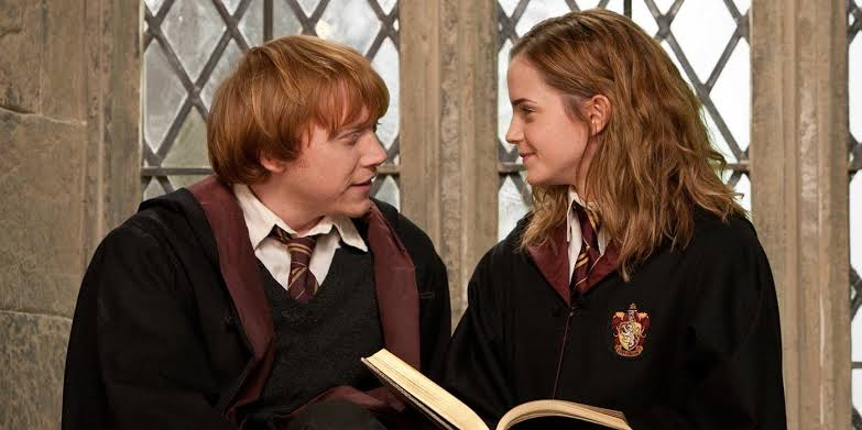 Rupert Grint’s Ron with Emma Watson’s Hermione in Harry Potter | image: Warner Bros