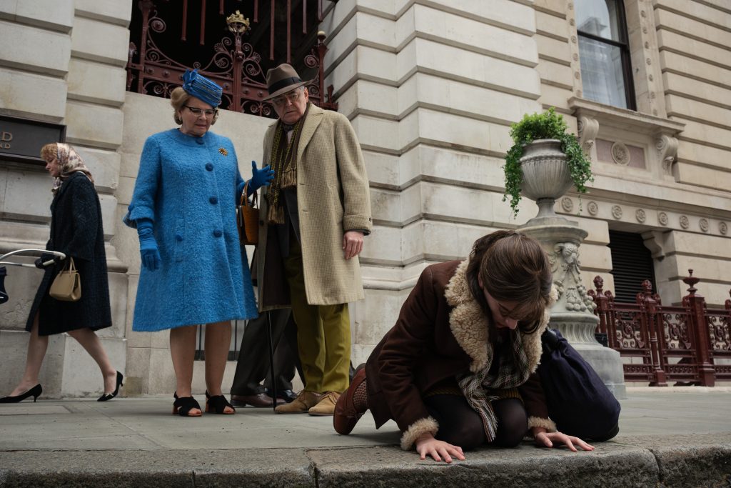 L-R Kevin McNally as Roman Castavet, Dianne Wiest as Minnie Castavet and Julia Garner as Terry Gionoffrio in Apartment 7A.