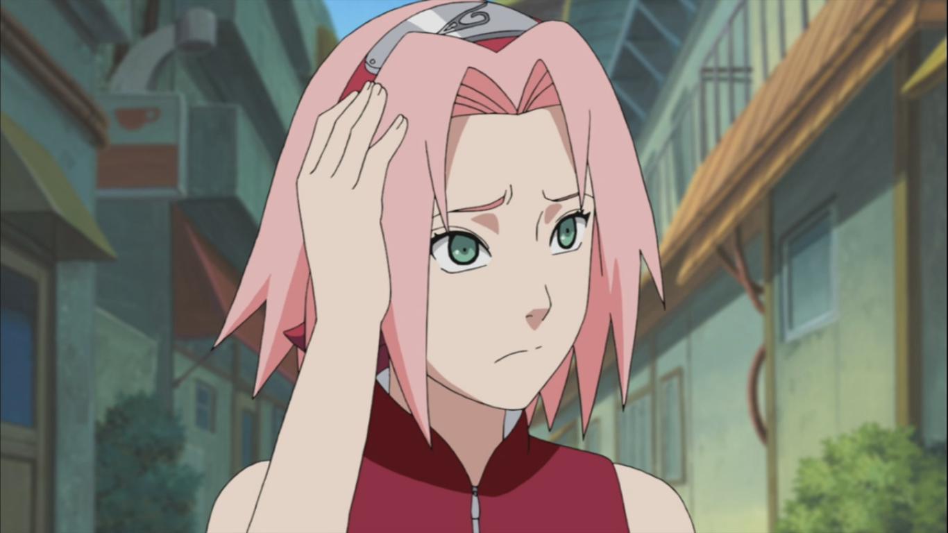 Sakura has her hand on her head as if in confusion 