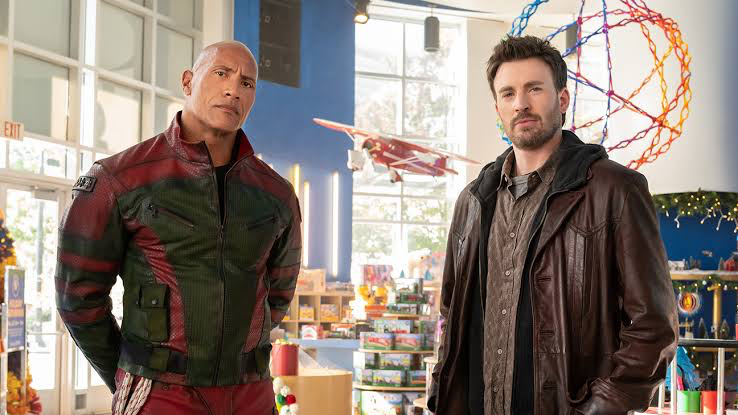 Dwayne Johnson and Chris Evans in Red One (2024) | image: Amazon MGM Studios, Warner Bros. Pictures