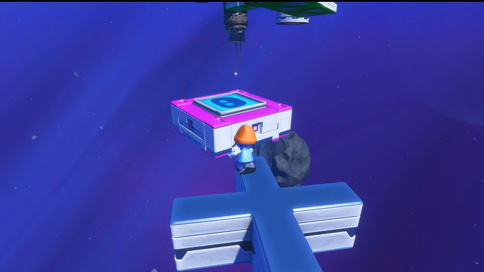 An in-game screenshot of Astro Bot showing making its way through the button platforms.