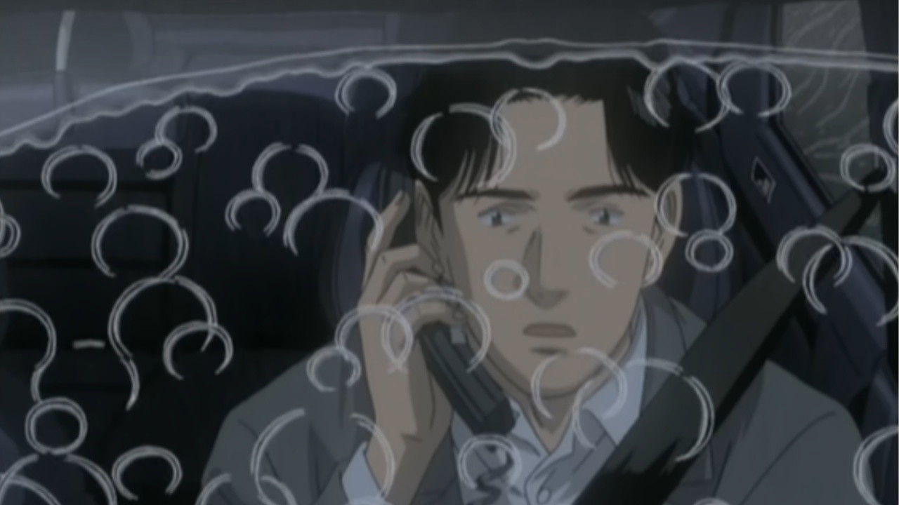 Kenzo Tenma is sitting in a car with water droplets falling on the windshield 