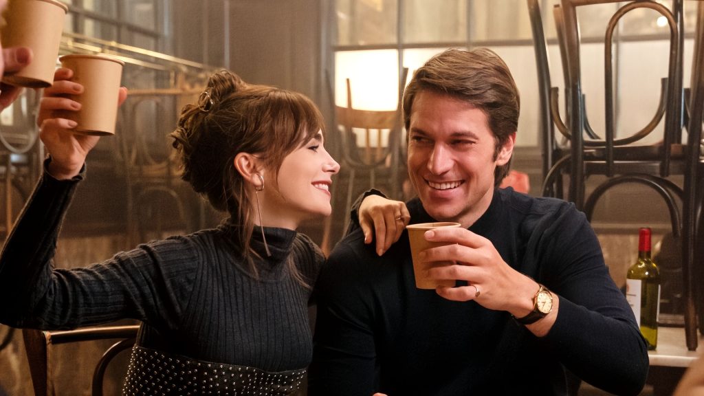 Lucas Bravo and Lily Collins in a still from Emily in Paris