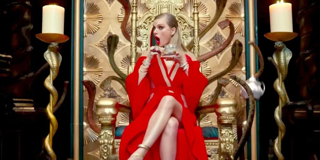 Taylor Swift dressed in red in her popular Look What You Made Me Do music video.