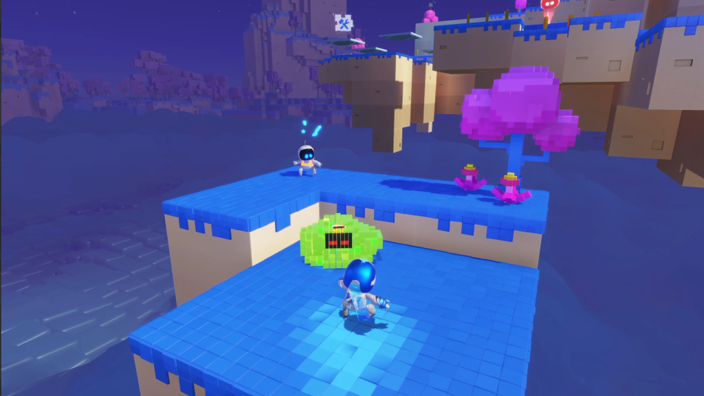 An image of Astro rescuing a bot in front of a green enemy where the player can find the first of the Boxel Bust-Up Collectible locations. 