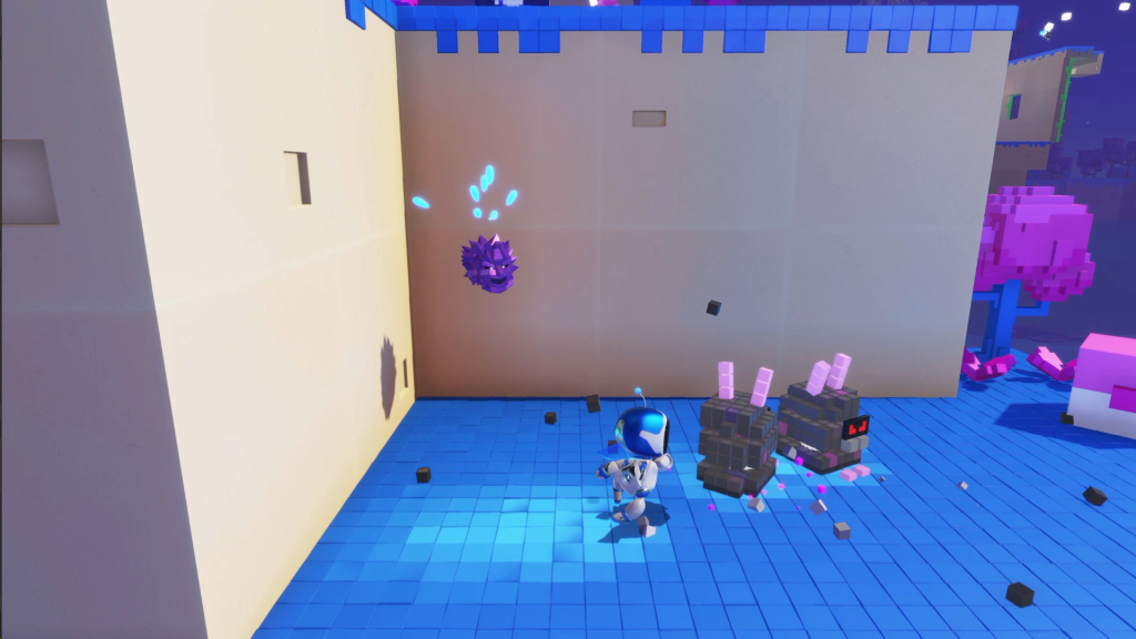 Astro next to two bunny enemies with the Polygon Man bot on the left. 