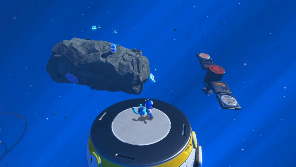 Astro standing atop a satellite and looking at the final puzzle piece in the level. 