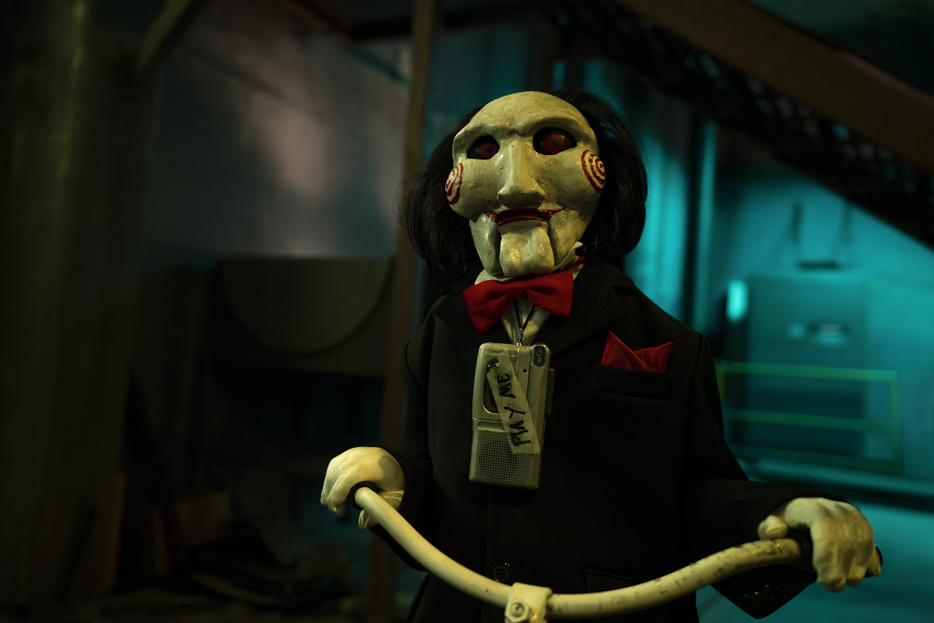 An image of Billy the puppet from Saw.