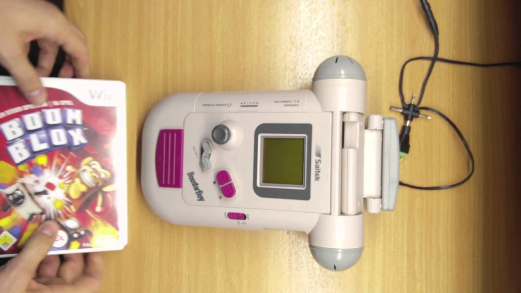 The Saitek Booster Boy accessory working on the Game Boy.