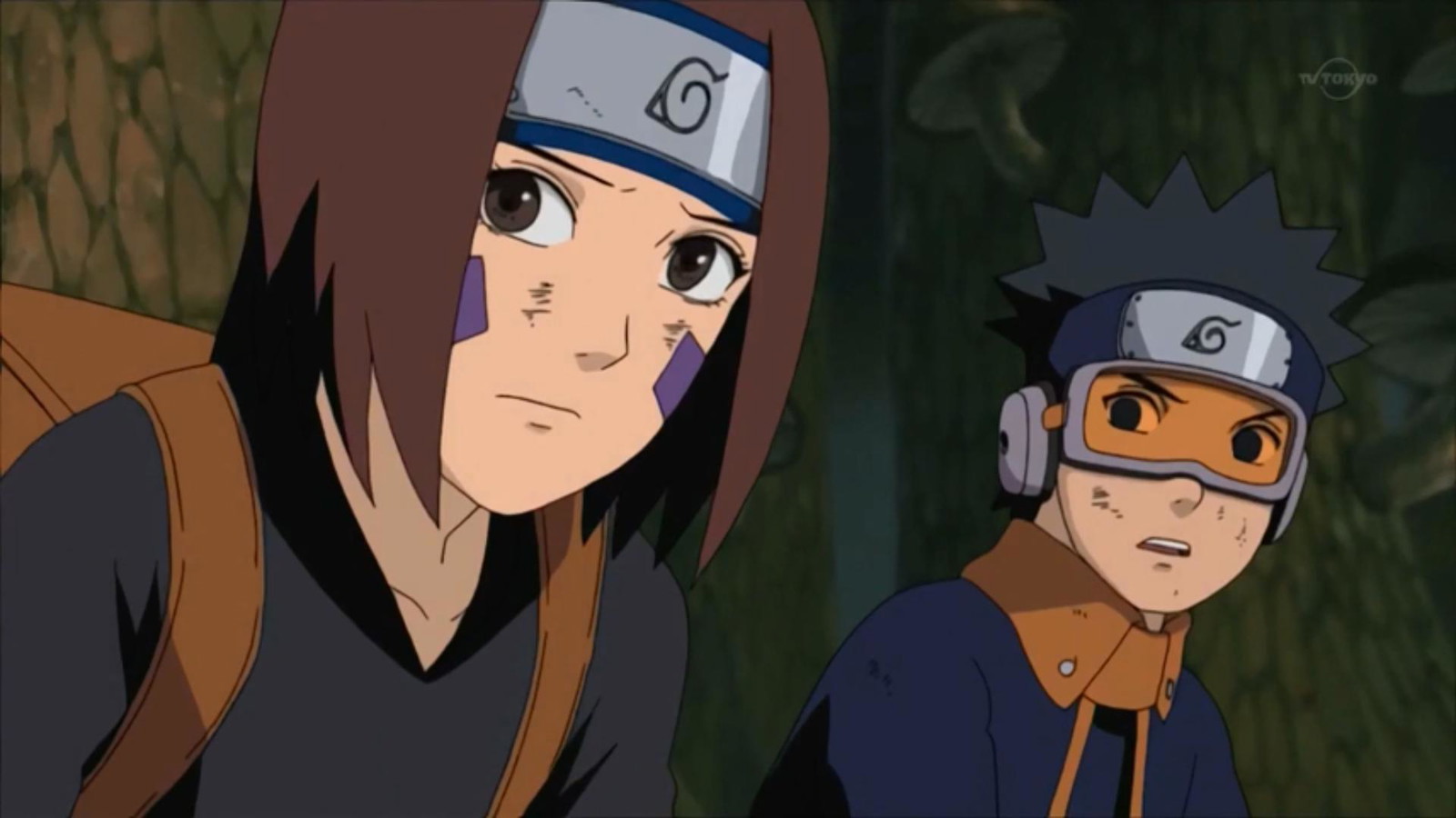 Obito is looking at Rin in the picture and they both look injured 