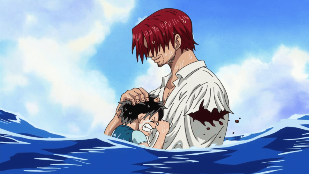 Shanks saves Luffy from a Sea King and loses his arm in One Piece.